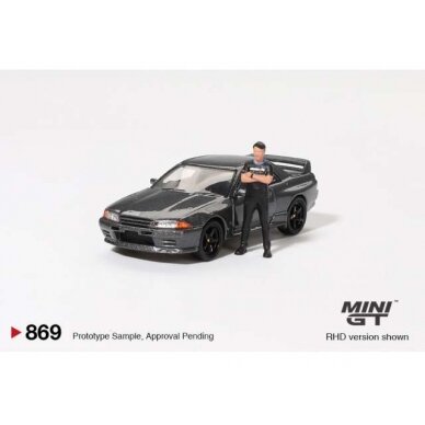 PRE-ORD3R Mini GT Modeliukas 1/64 1992 Nissan Skyline GT-R (R32) Nismo with Tsugio Matsuda Figure, gunmetal